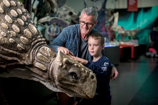 A family visiting Dinosaurs