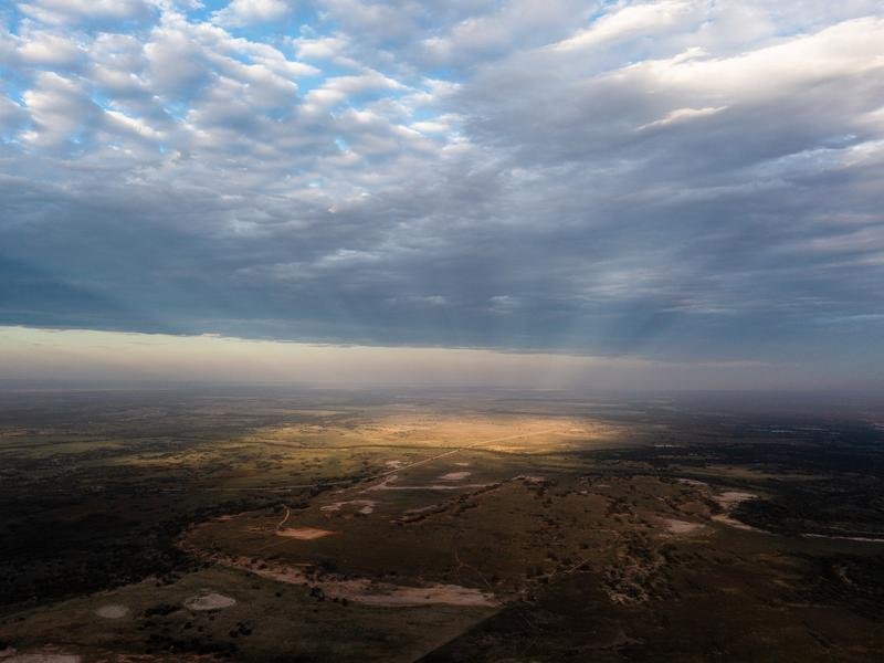 A patch of sunlight illuminating land south east of Menindee,